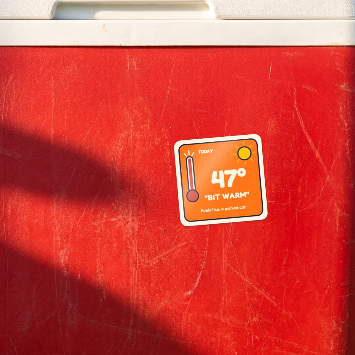 47 Degrees: Bit Warm sticker on a red esky