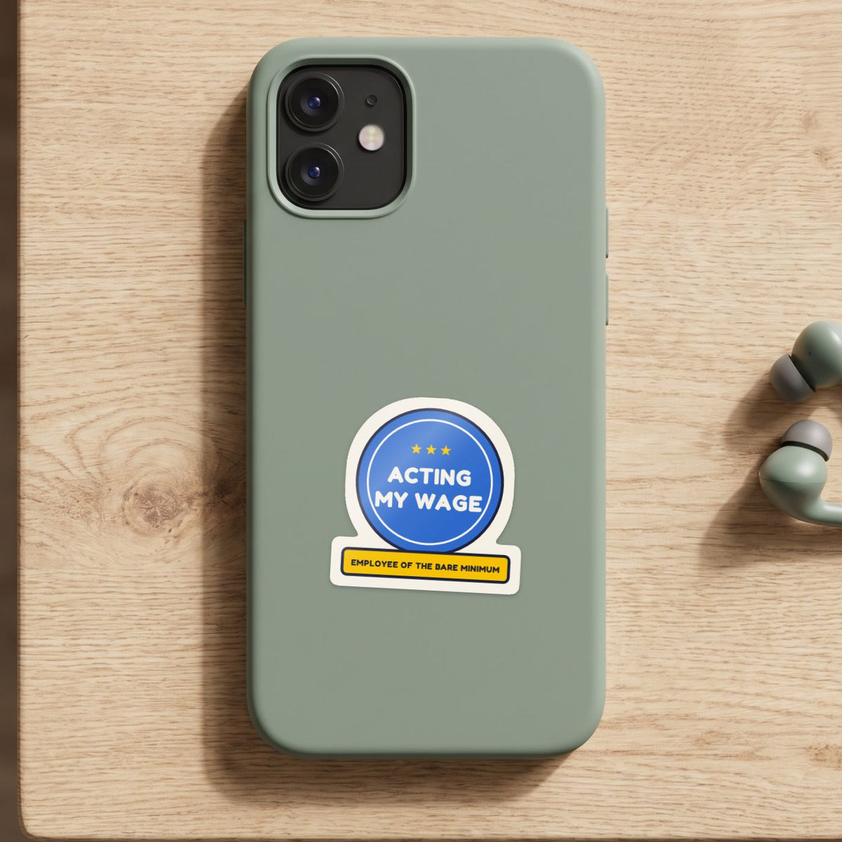 Acting My Wage sticker on a green phone case