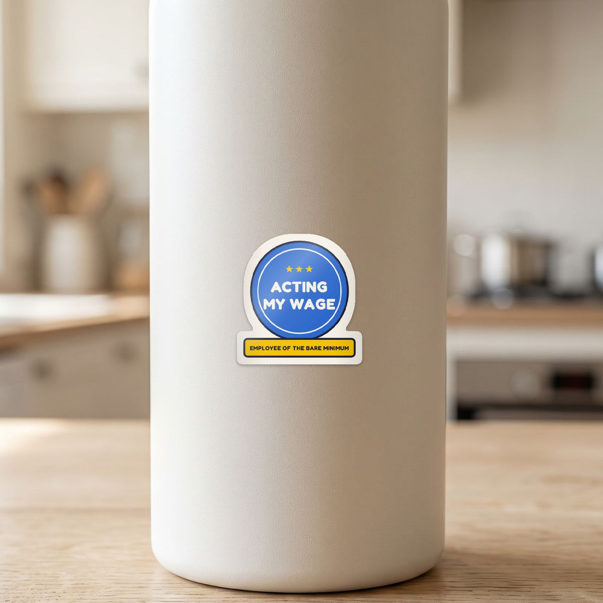Acting My Wage sticker on a white drink bottle