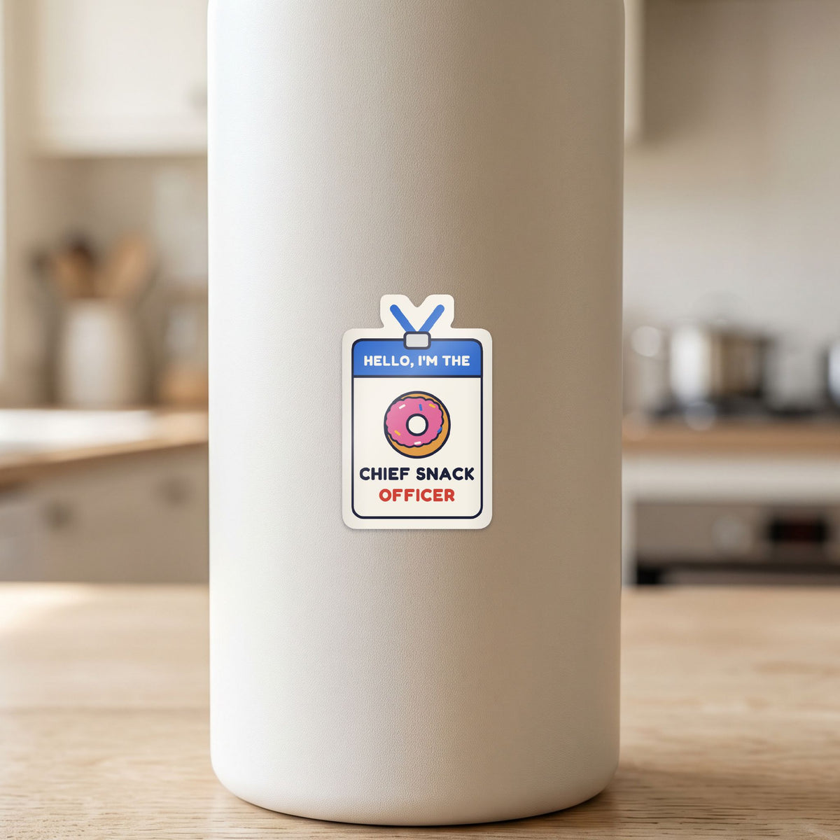 Chief Snack Officer sticker on a white drink bottle