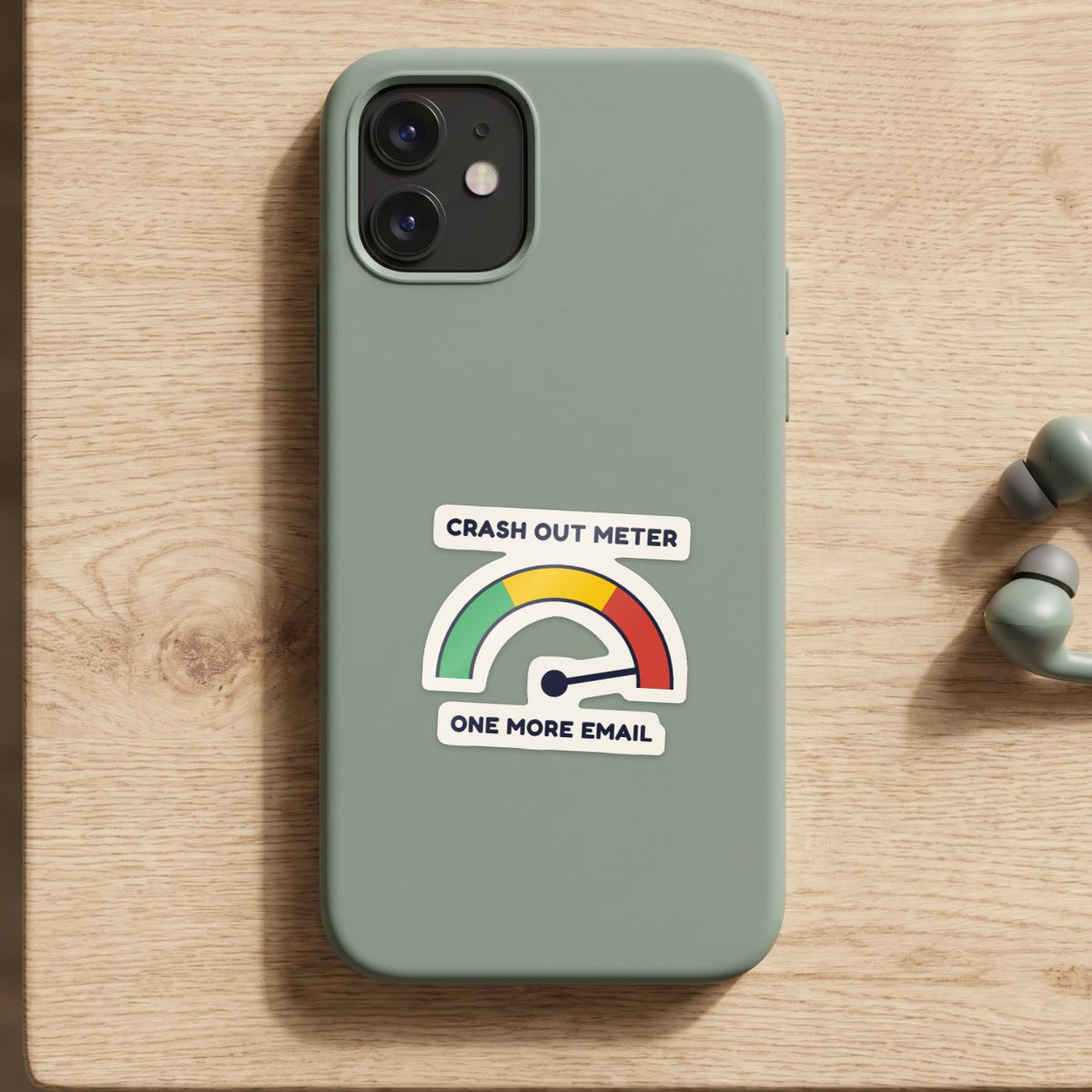 Crash Out Meter sticker on a green phone case