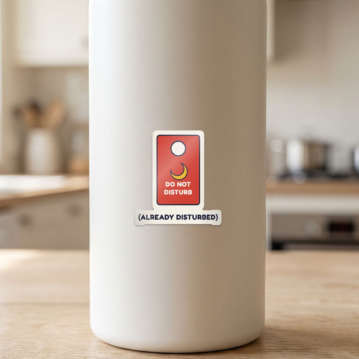 Do Not Disturb (Already Disturbed) sticker on a white drink bottle