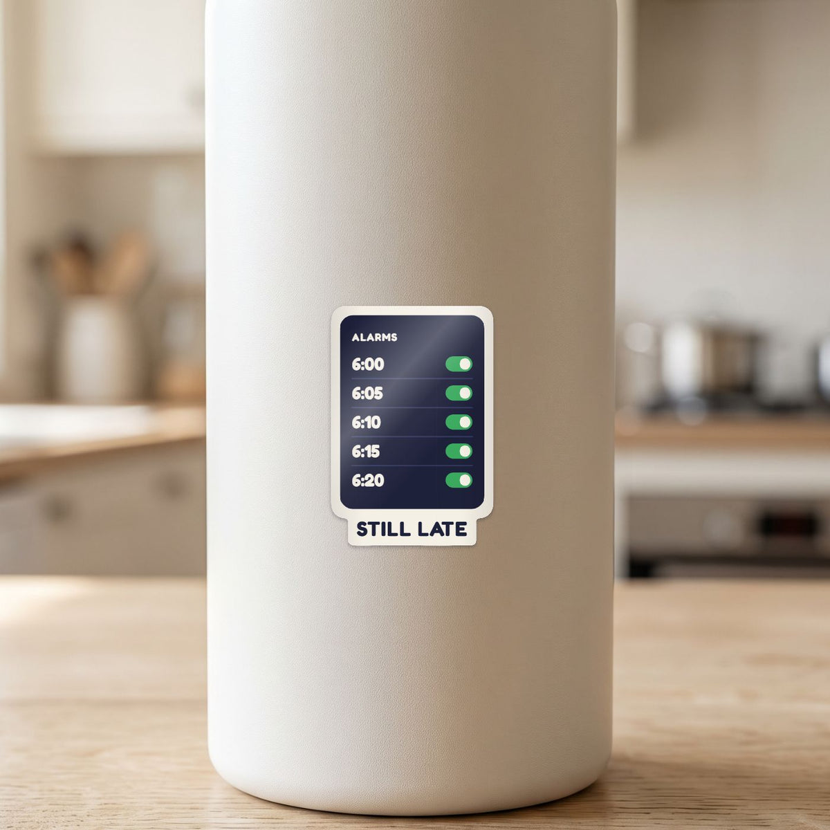 Five Alarms, Still Late sticker on a white drink bottle