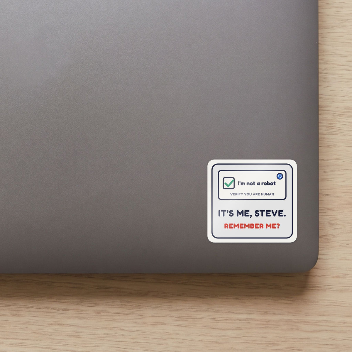 I'm Not a Robot. It's Me, Steve. sticker on the lid of a grey laptop