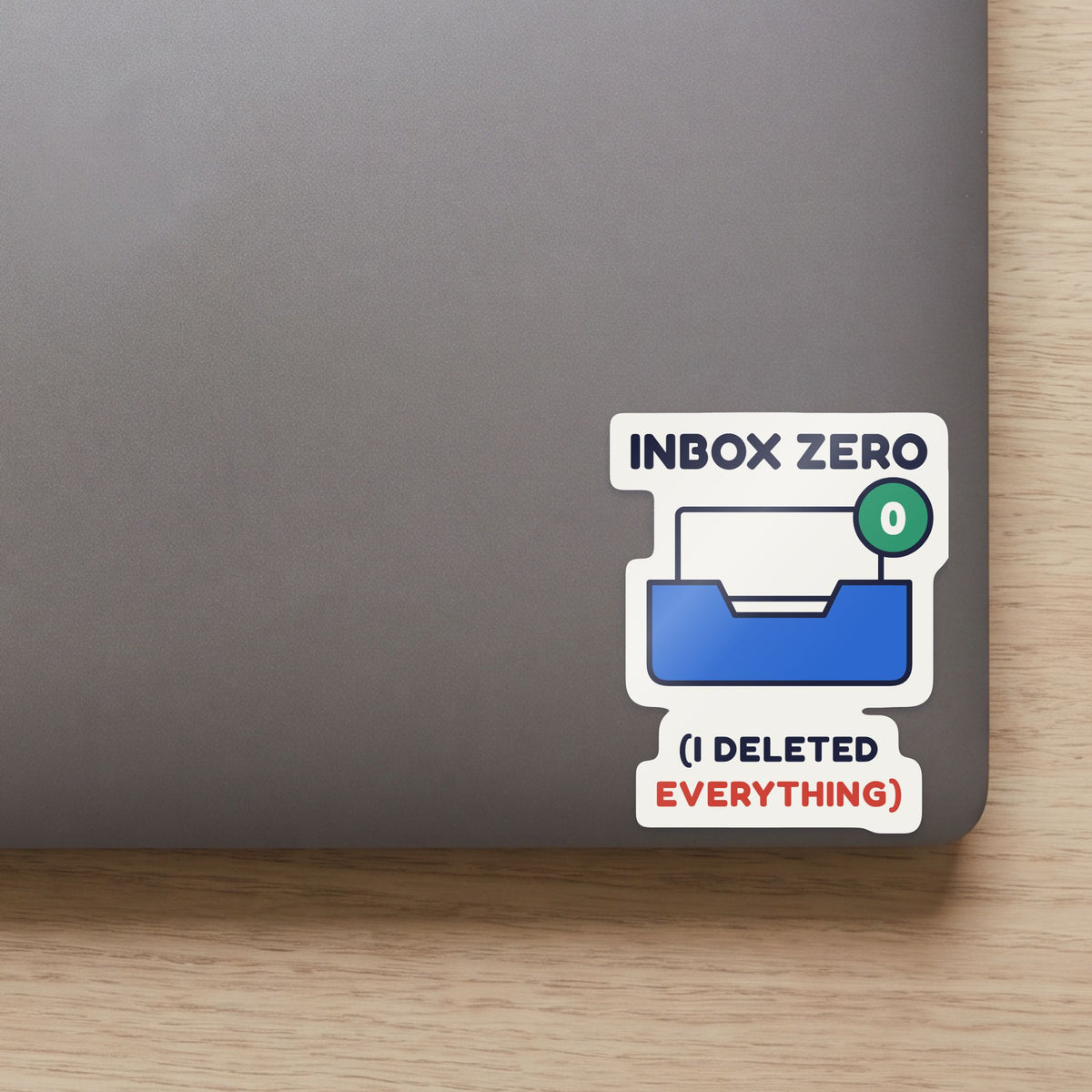 Inbox Zero (I Deleted Everything) sticker on the lid of a grey laptop