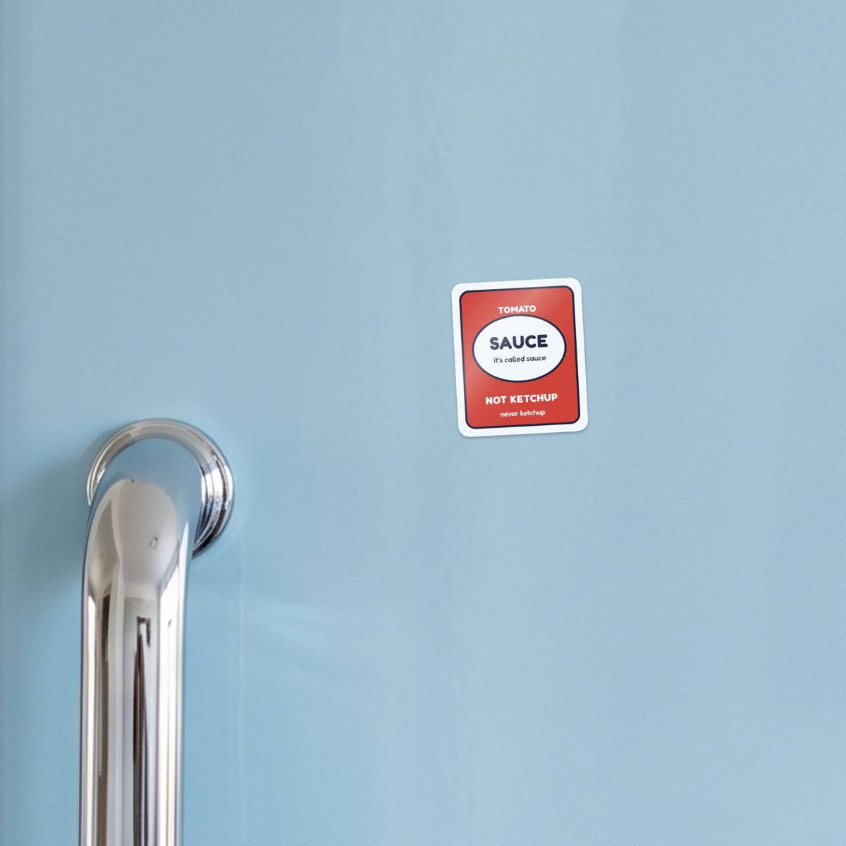 It's Sauce, Not Ketchup sticker on a blue fridge door