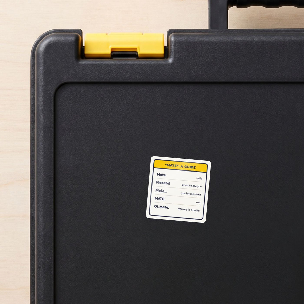 Mate: A Guide sticker on a black toolbox