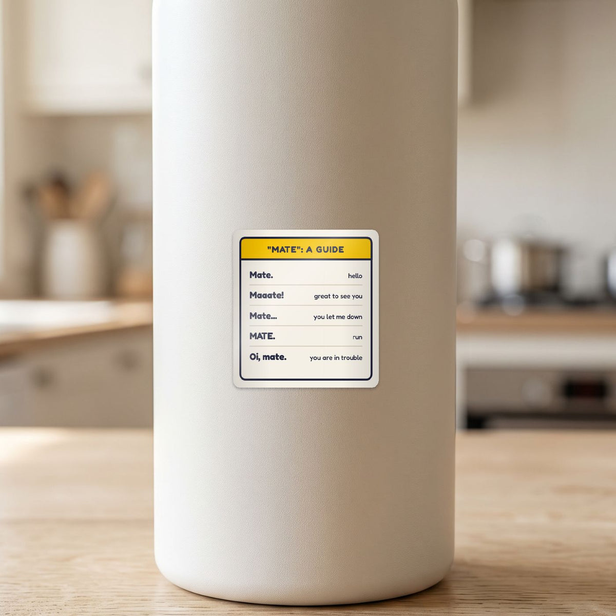 Mate: A Guide sticker on a white drink bottle