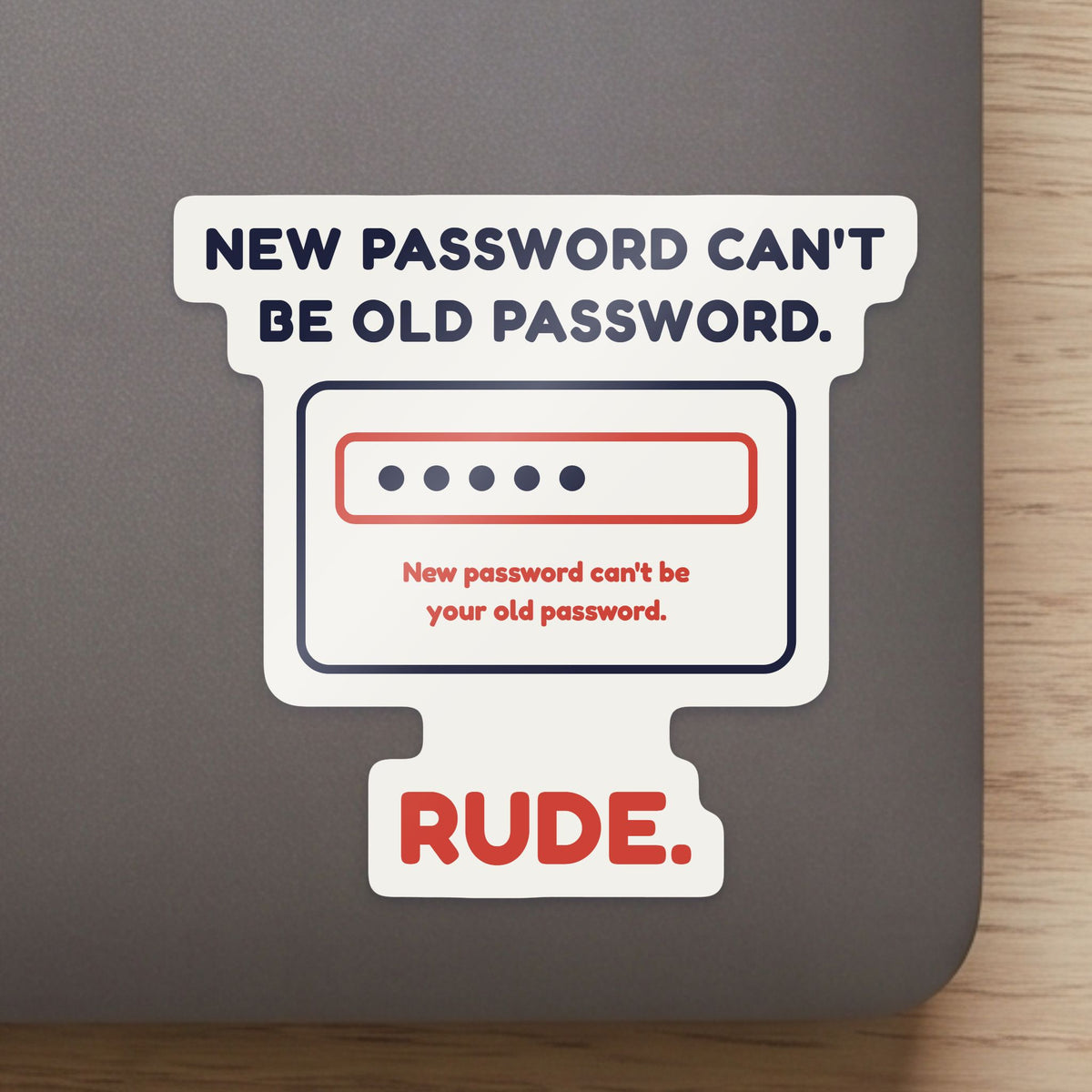 New Password Can't Be Old Password sticker close up on a laptop lid, showing the gloss and the white cut edge