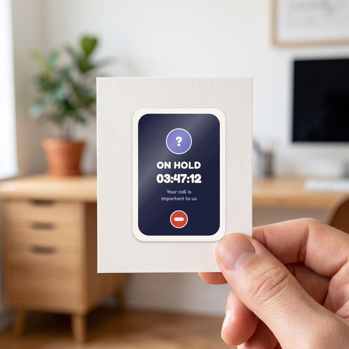 On Hold: 03:47:12 sticker held in a hand on its white backing card