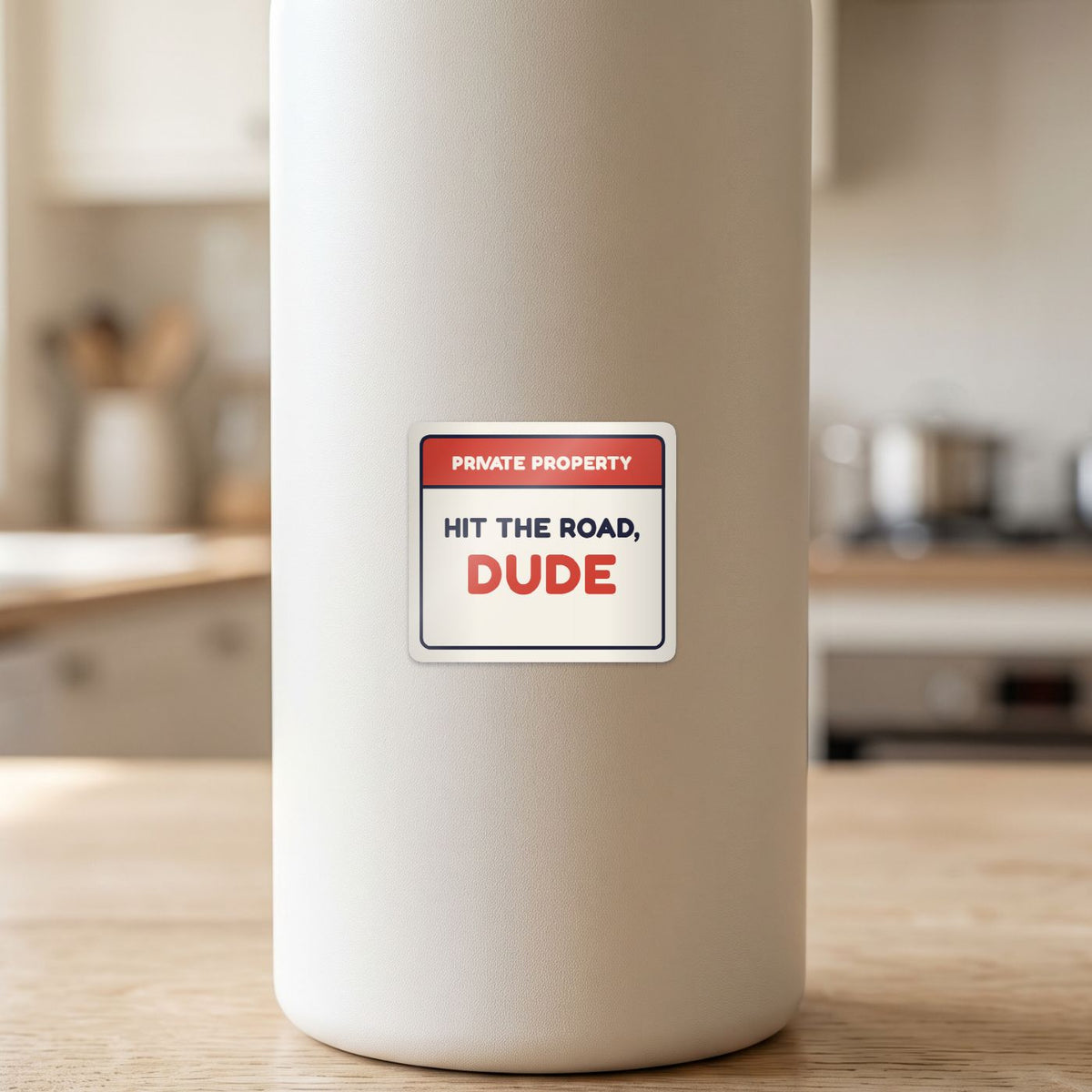 Private Property: Hit the Road, Dude sticker on a white drink bottle