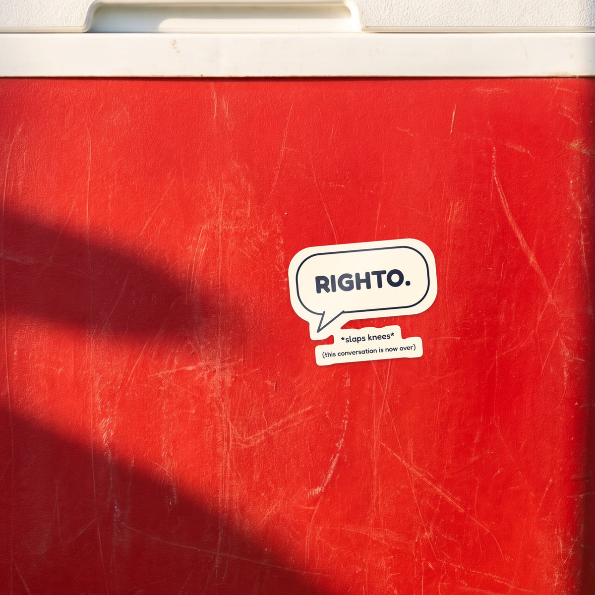 Righto. (Slaps Knees) sticker on a blue fridge door