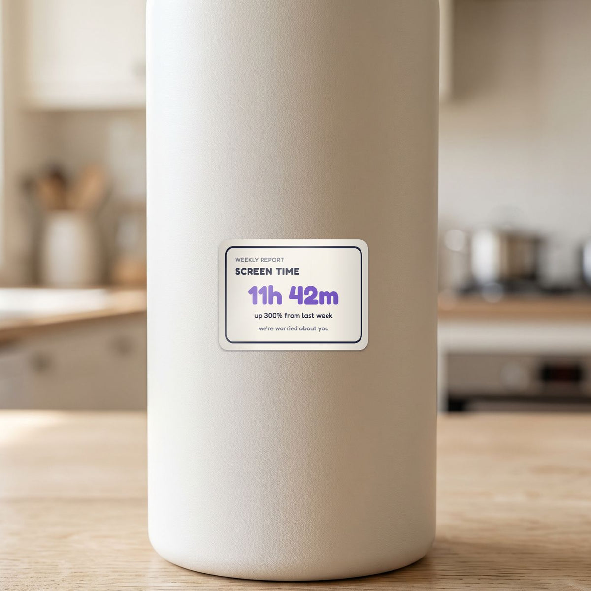Screen Time: 11h 42m sticker on a white drink bottle
