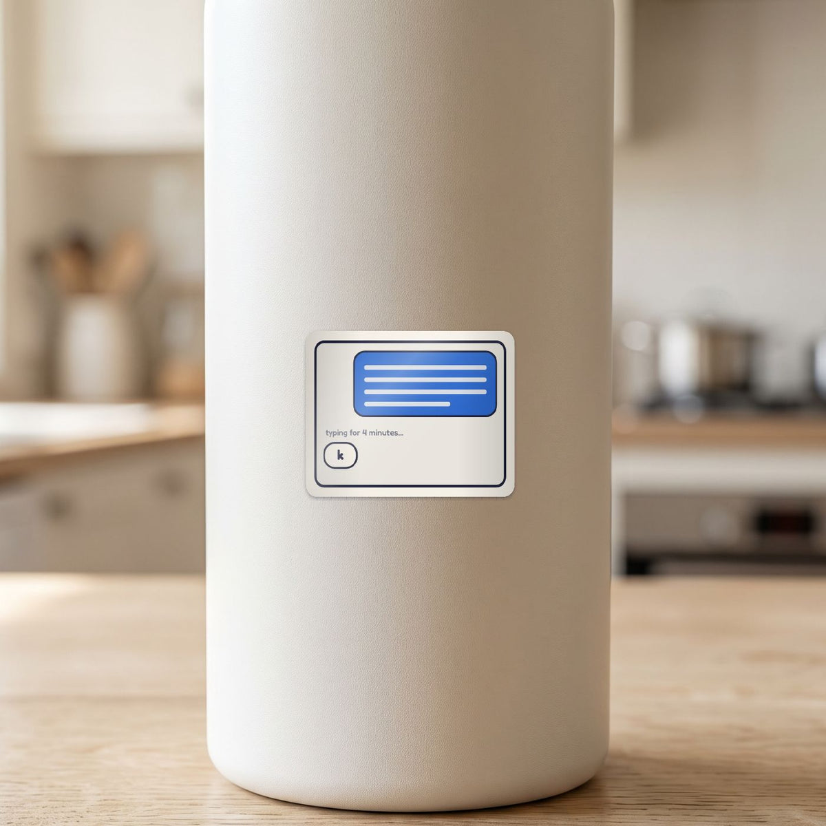 Typing for 4 Minutes: k sticker on a white drink bottle