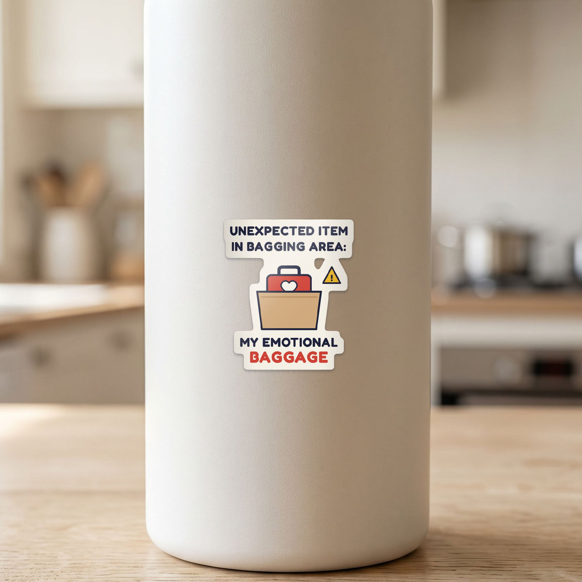 Unexpected Item in Bagging Area sticker on a white drink bottle