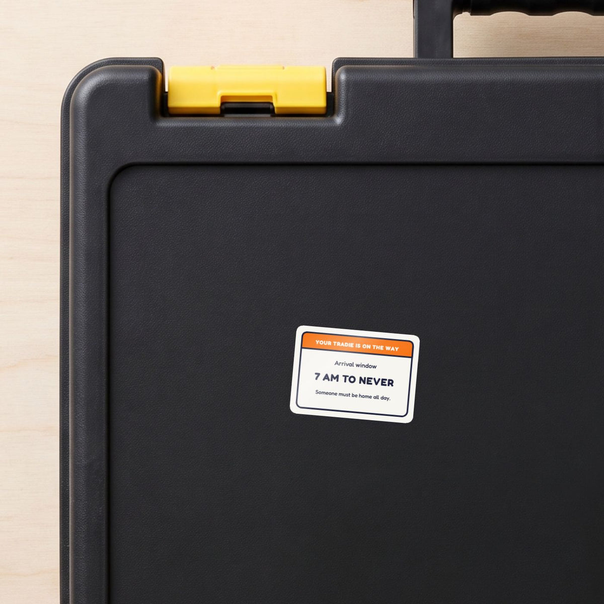 Your Tradie: 7 am to Never sticker on a black toolbox